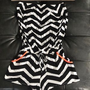 Romper black and white with bright coral piping